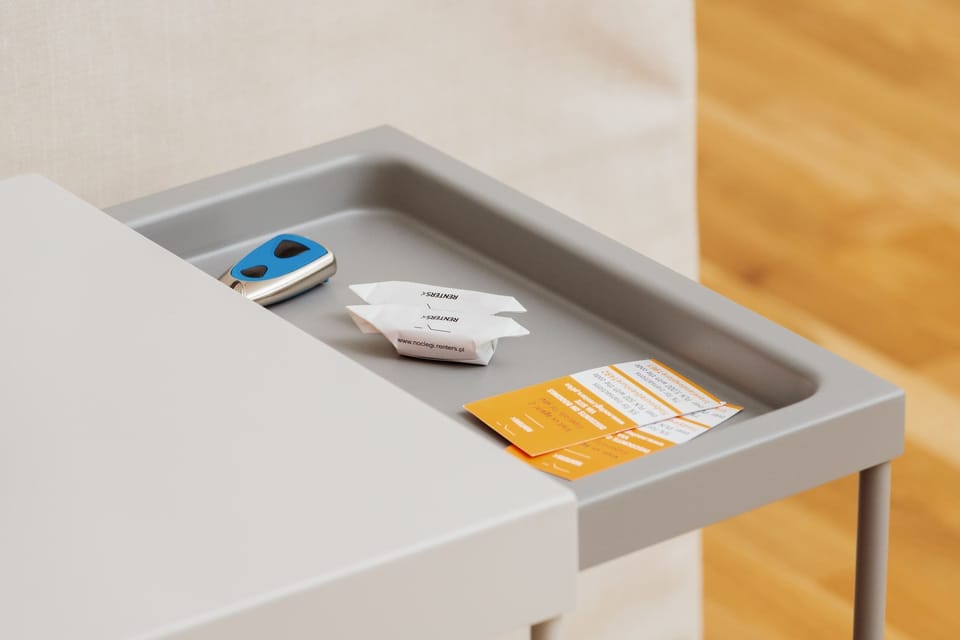 A modern coffee table in the living room features a sleek hidden drawer for storing small items like remotes and keys.