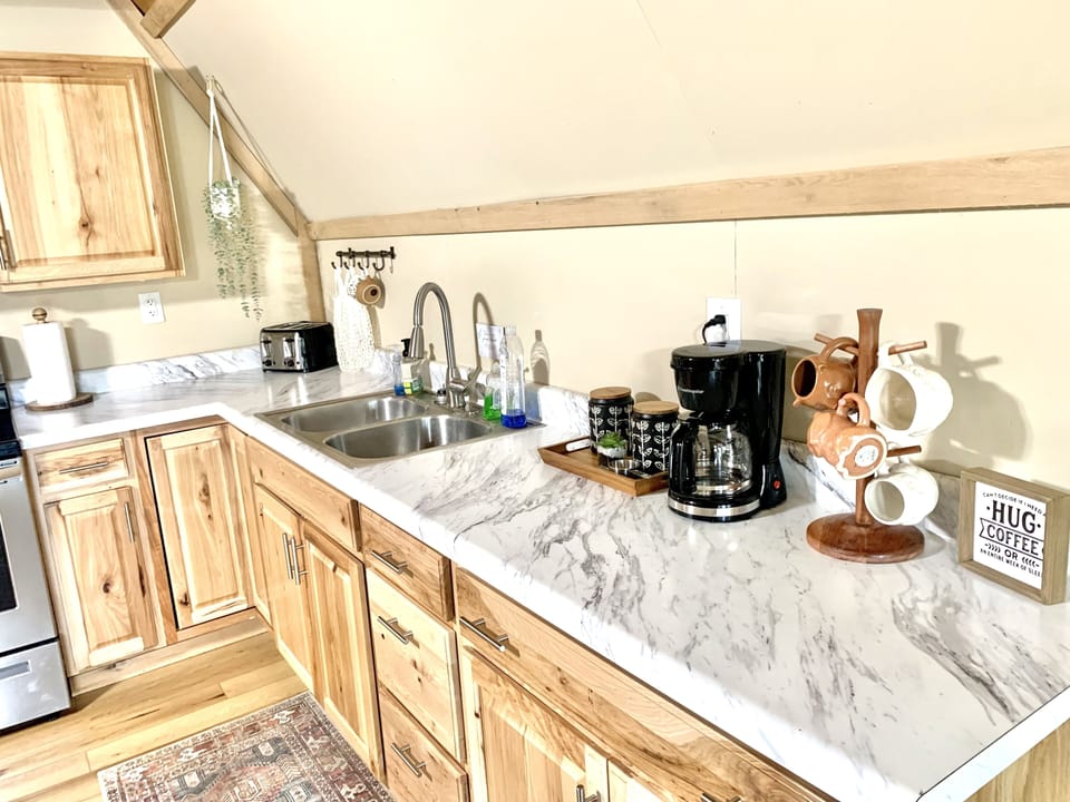 Fully equipped kitchen with coffee available for you