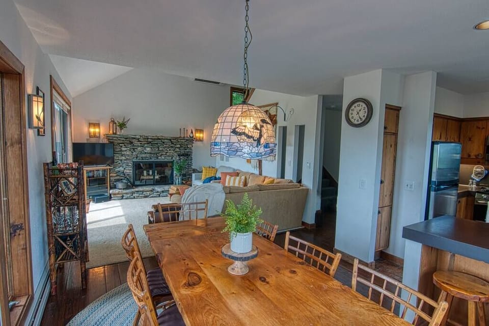 Dining area into kitchen and living room