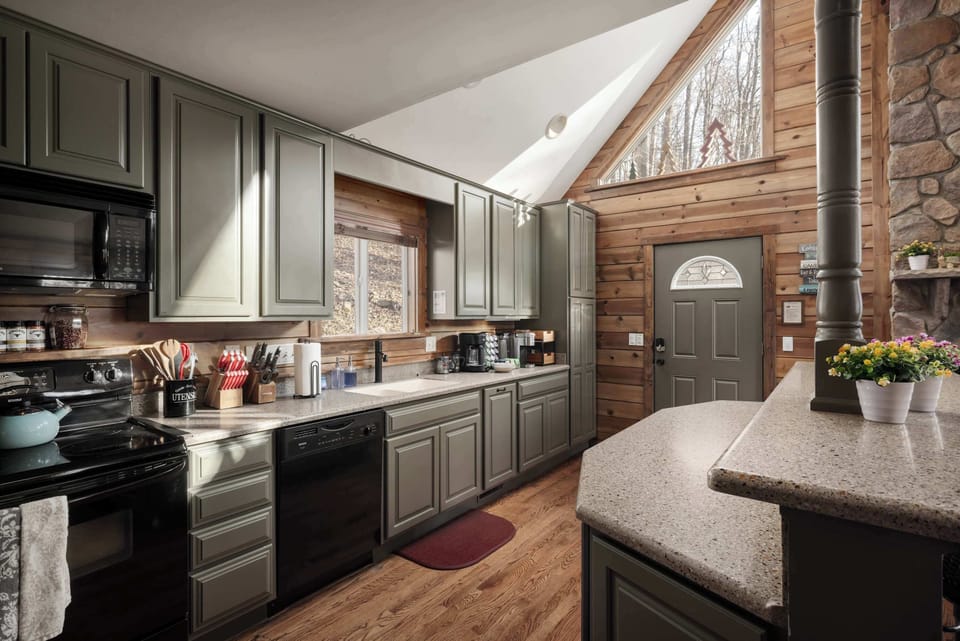 Sunlit Kitchen with Modern Amenities – A stylish, fully stocked kitchen with natural light, ample counter space, and all the essentials for home cooking.