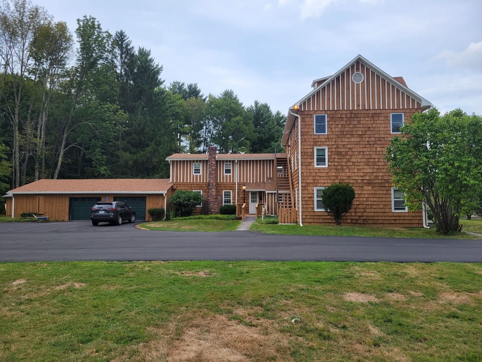 Parking area and side view of Gedney House