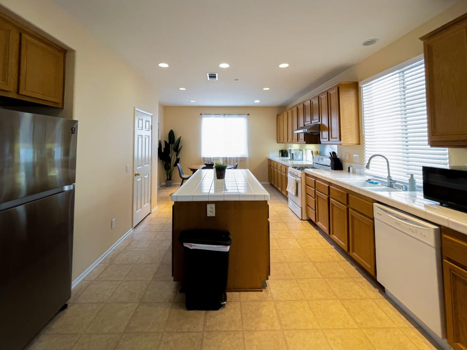 Our fully equipped kitchen with island layout. 
