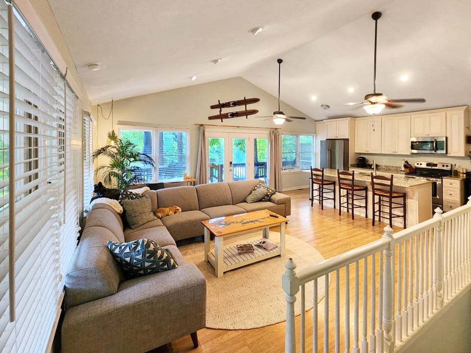 Main living room with island kitchen and full views of our cove.  
