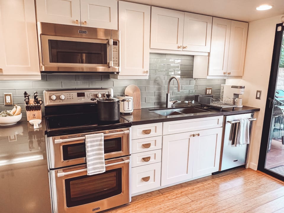 Kitchen has all the small appliances, utensils and accessories you could need