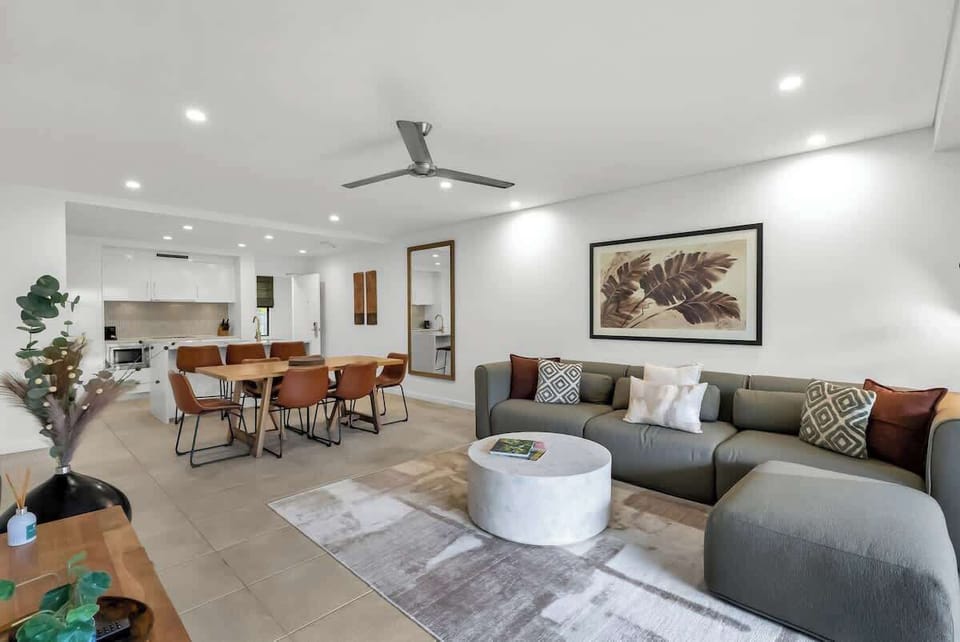The open layout connects the living area, dining, and kitchen, making shared time effortless and enjoyable.