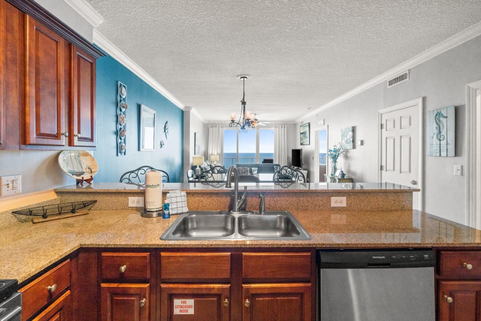 Fully Stocked Kitchen with Bar Seating