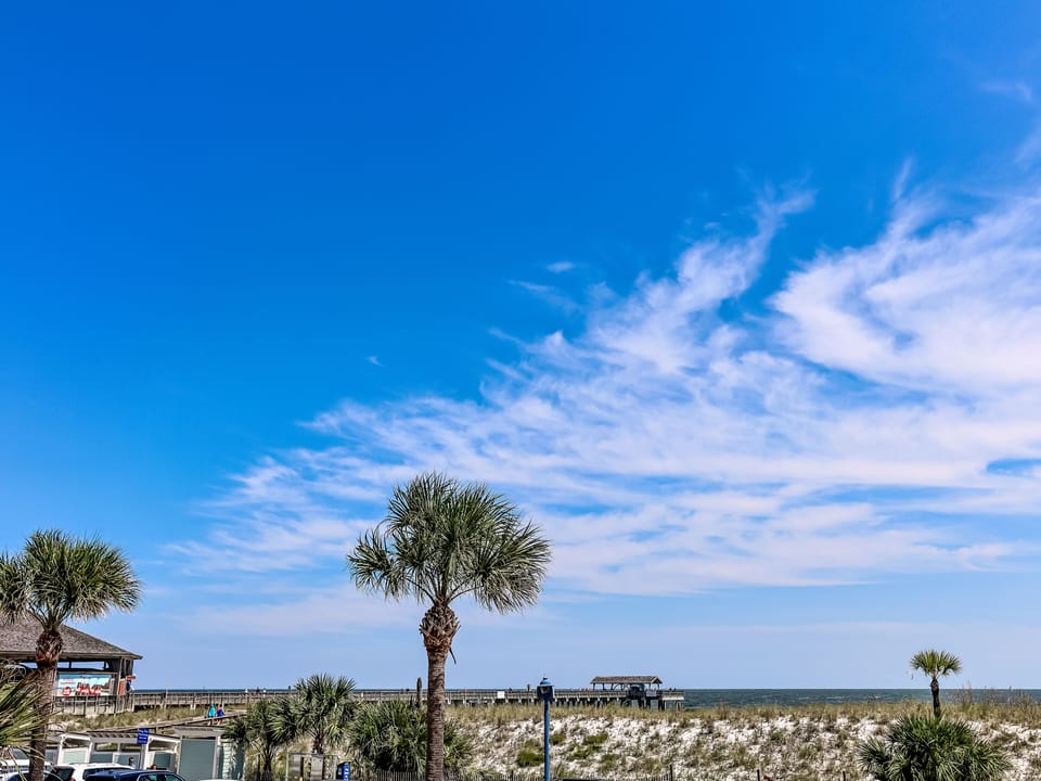 View of the Tybee pier from balcony. You are steps from all the action at South beach!
