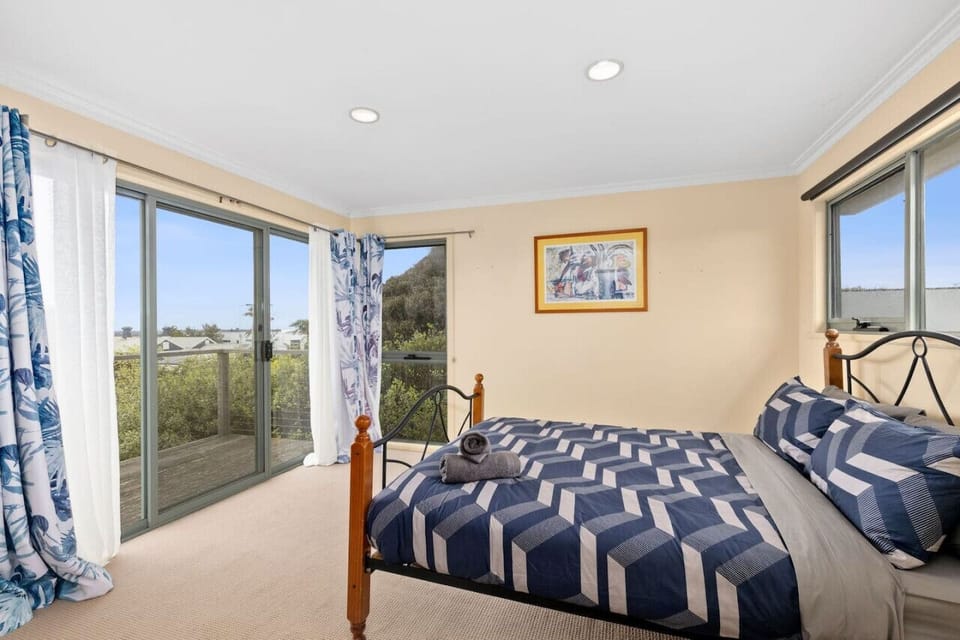 Master bedroom with balcony and ensuite