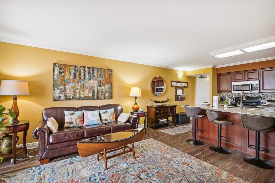 Welcome to this bright, airy, well-furnished ocean-view condo! - There's room for everyone to gather in the living room for games, TV, or to watch the beautiful sunsets! The sofa unfolds into a bed for 2, giving some lucky couple ocean views!