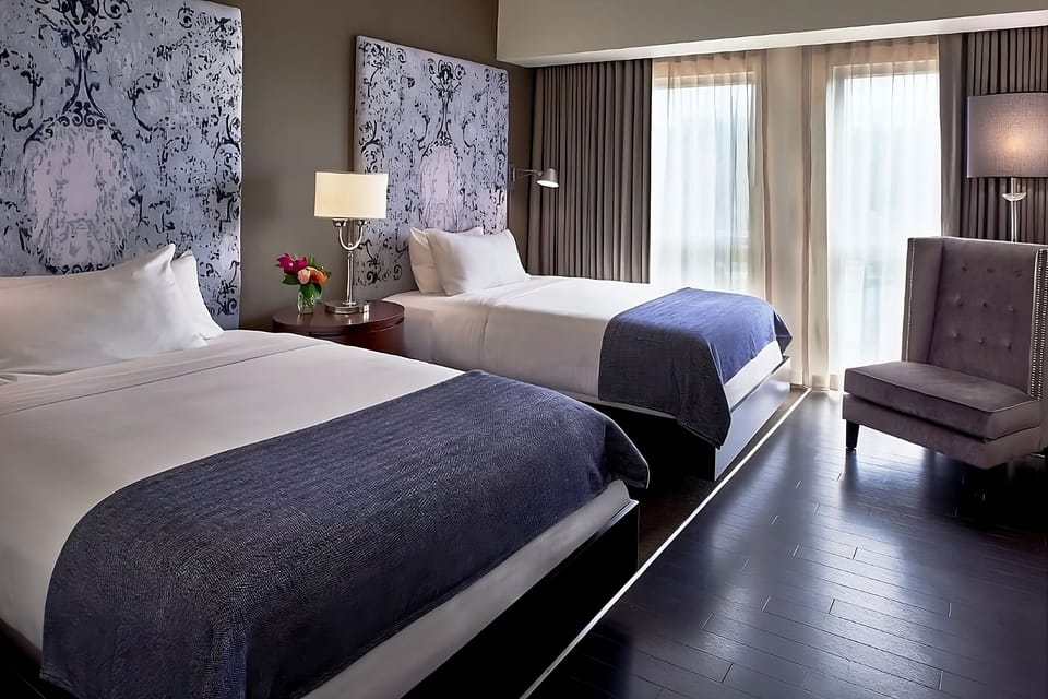Wake refreshed in a bright room with generous space to unwind.