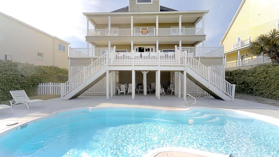 Private oceanfront pool with sundeck seating