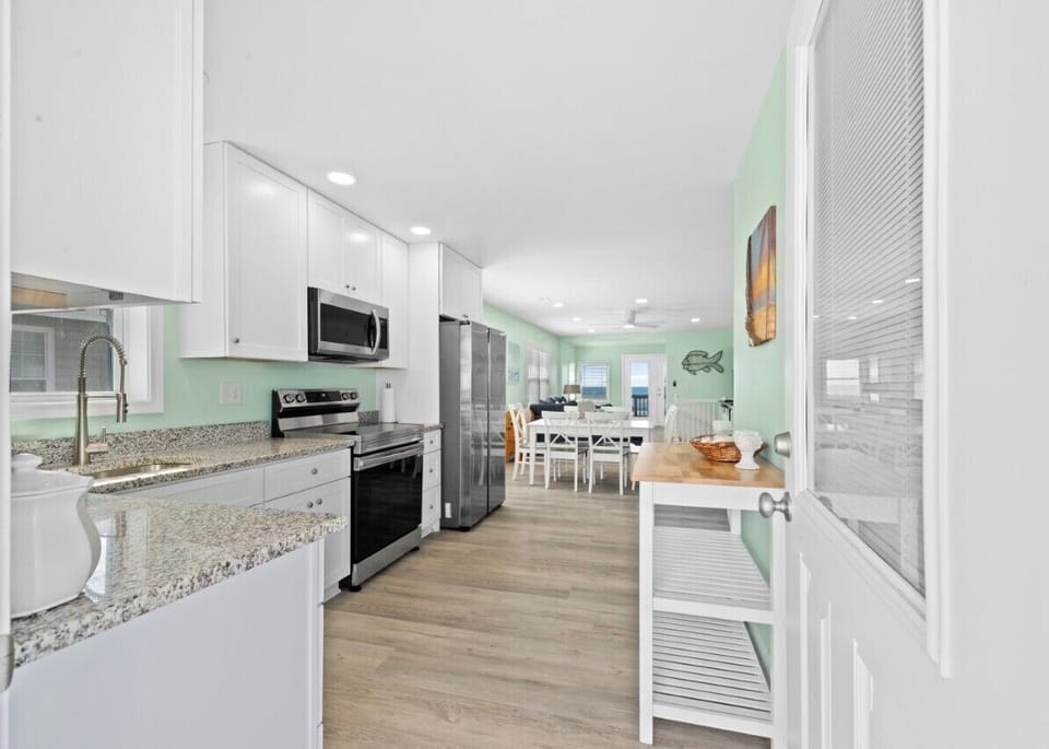 Granite kitchen with updated appliances for easy group meals