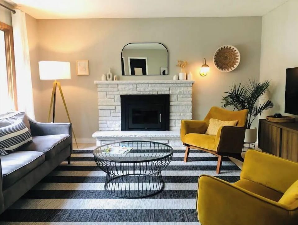 Comfortable living room with smart tv (fireplace is decorative only)