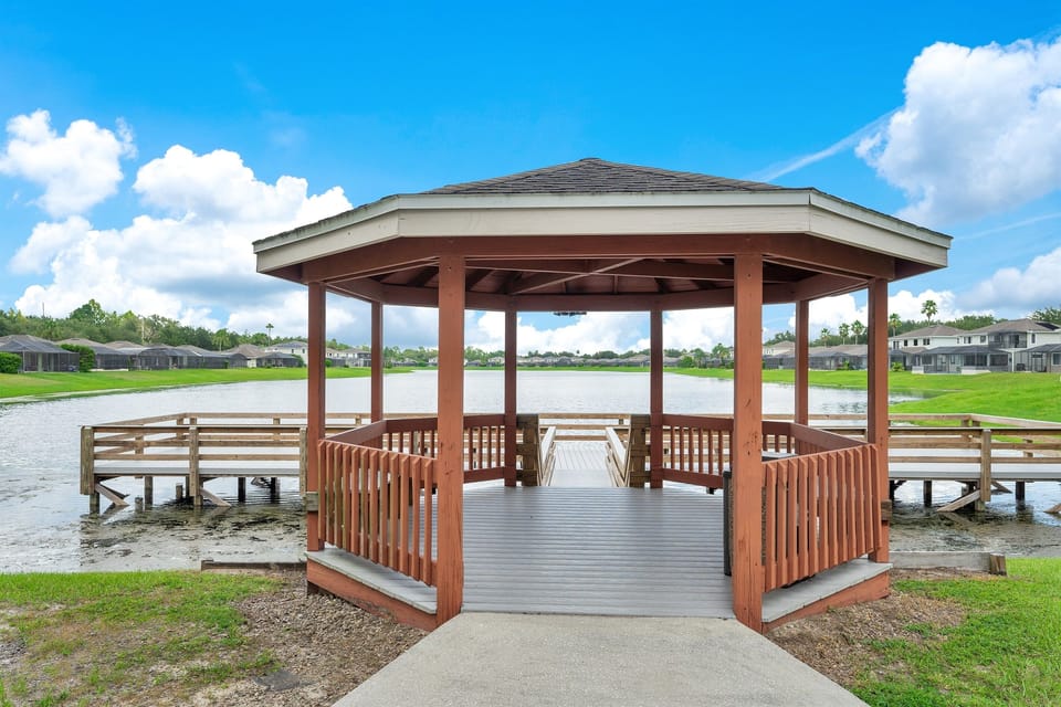 Explore the charm of our neighborhood with a visit to the public dock, where a gazebo overlooks a serene small lake. Keep an eye out for alligators, adding a touch of adventure to your stroll.