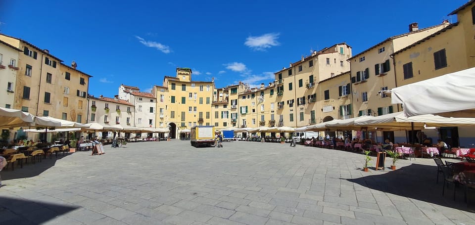 Cloud, Building, Sky, Daytime, Window, Urban Design, Road Surface, Road, City