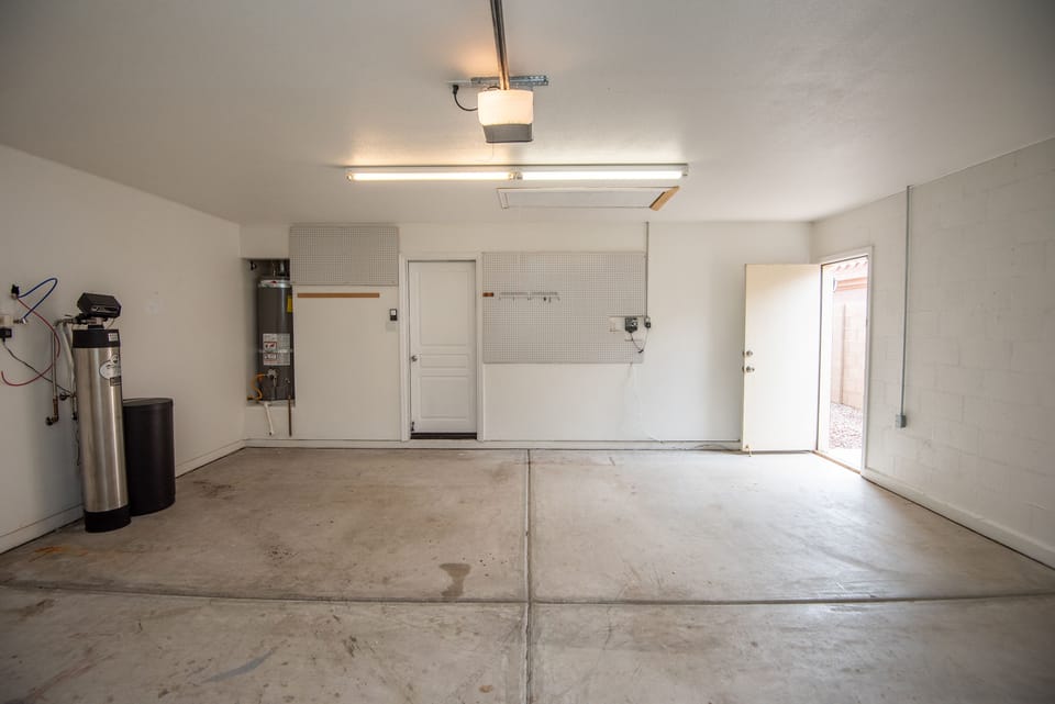 Garage available for use also includes ice chest, outdoor chairs 