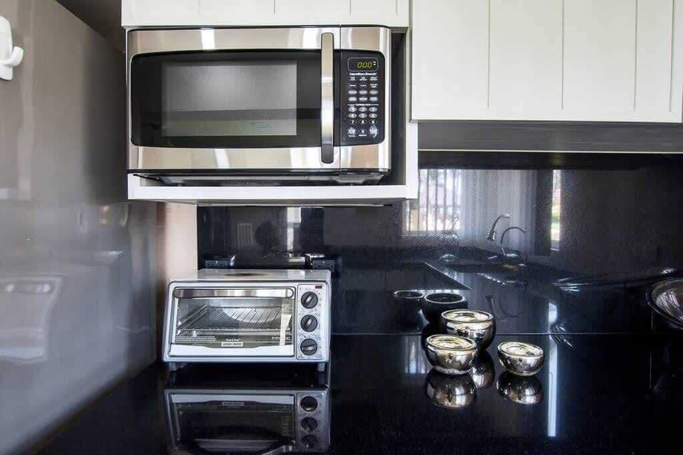 Kitchen with microwave and oven