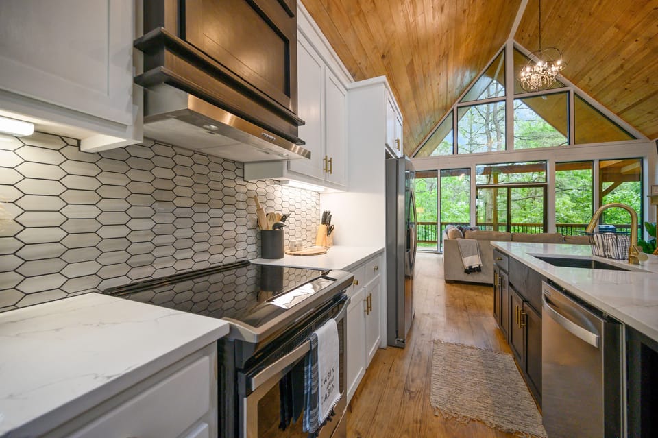 Large Counters, and glass top stove, makes preparing meals an easy task.
