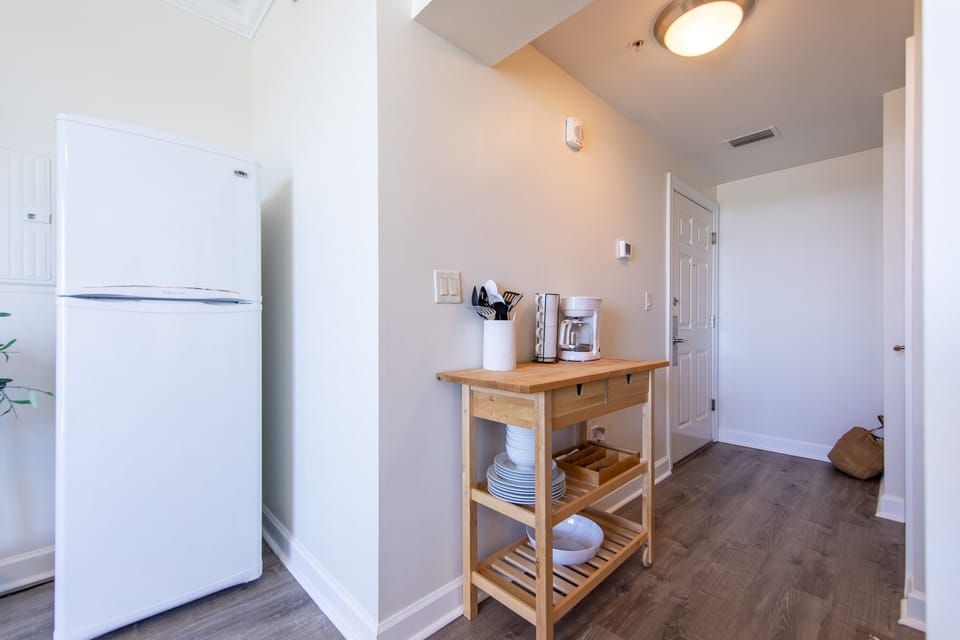 Refrigerator and bar cart.