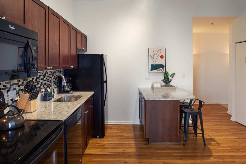 Gourmet kitchen with granite countertops and spacious island