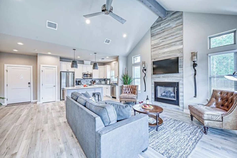 Flat screen TV and fireplace.