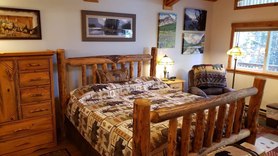 Upper level primary bedroom suite is a Montana vacation destination in itself!