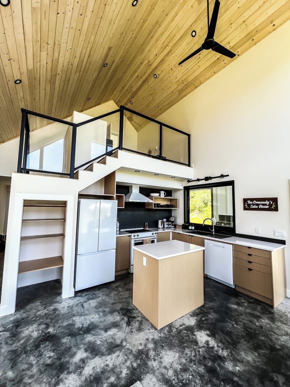 Full kitchen, and access to BBQ with pass through window. 