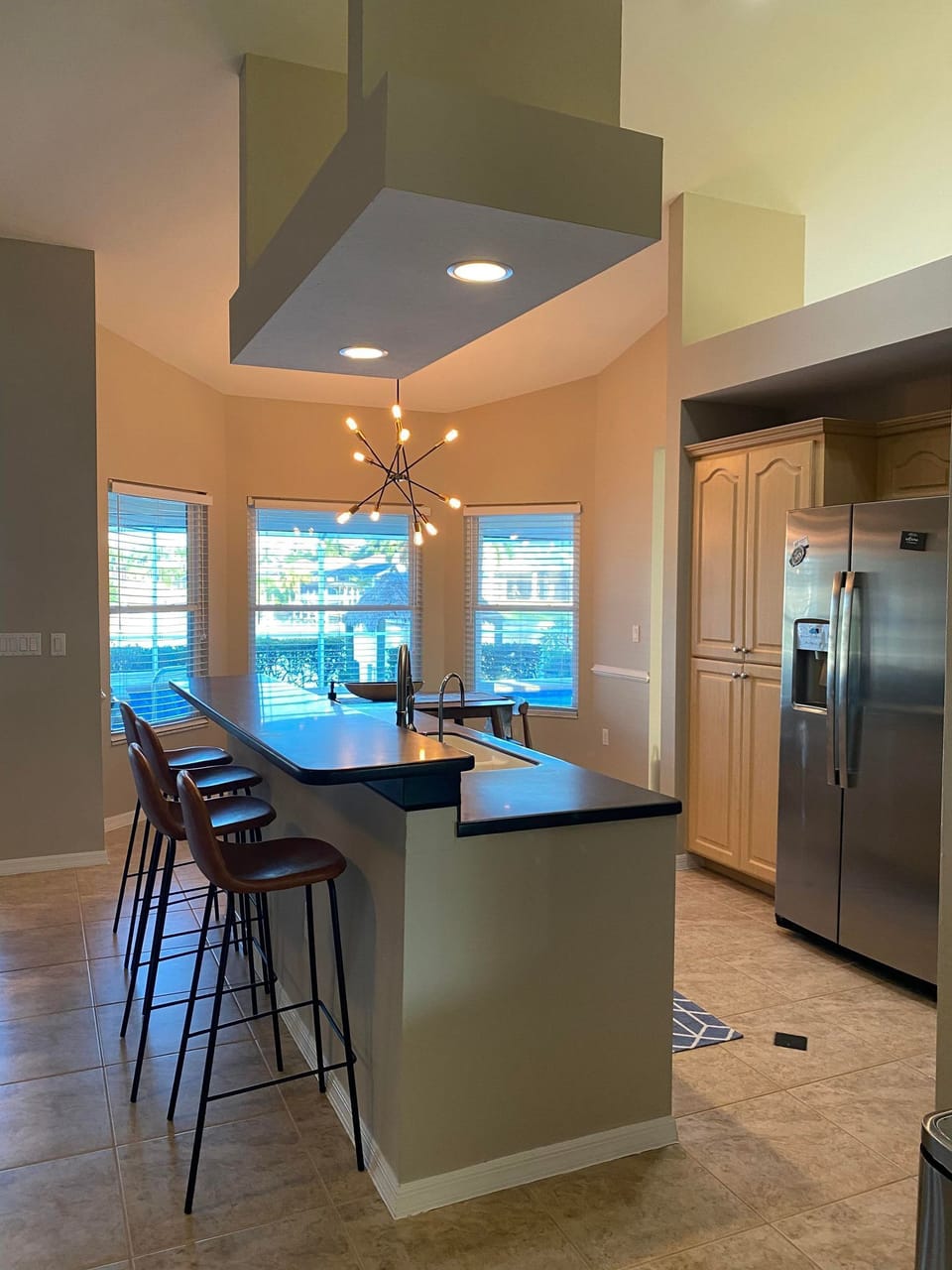 Bar seating in Kitchen.