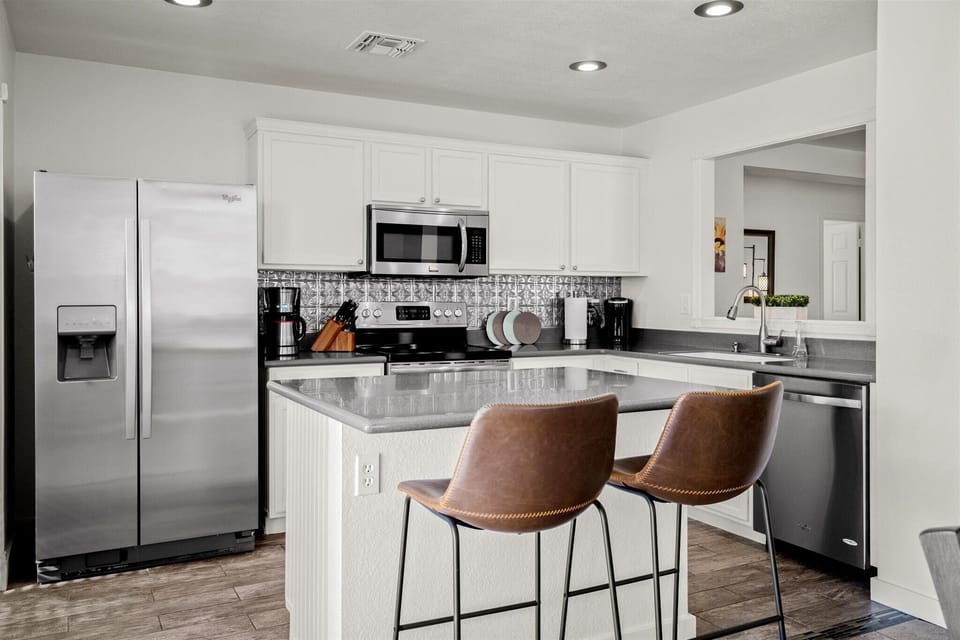 Kitchen Island has Power and Casual Seating