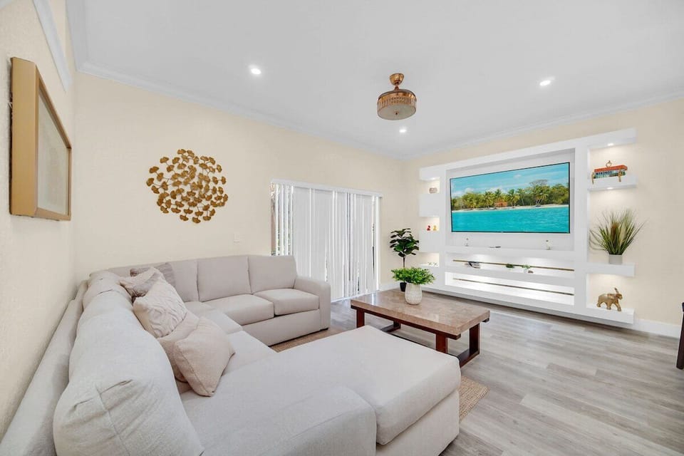 Enjoy movie nights in our family room featuring a huge 75 inch Roku TV and seating space for the whole family!