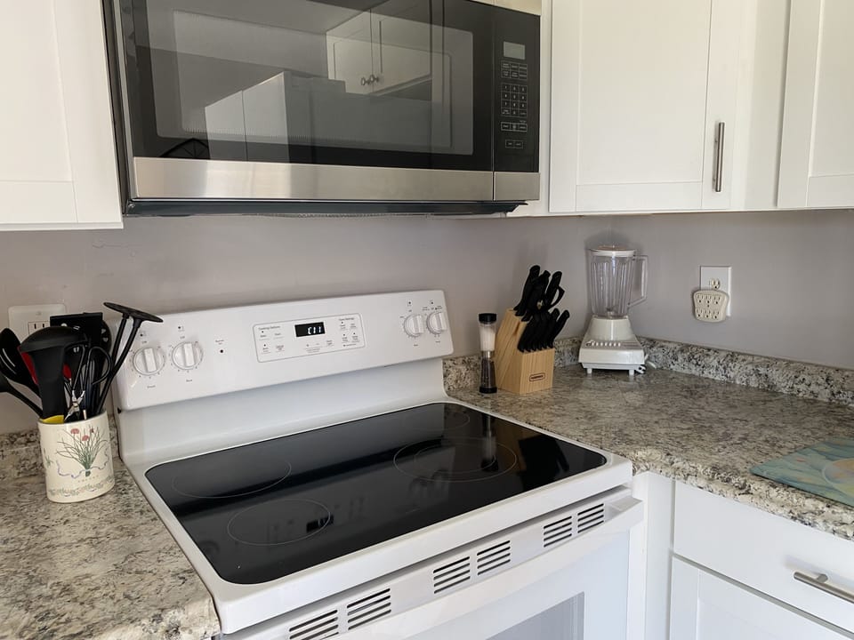New glass top stove with electric oven