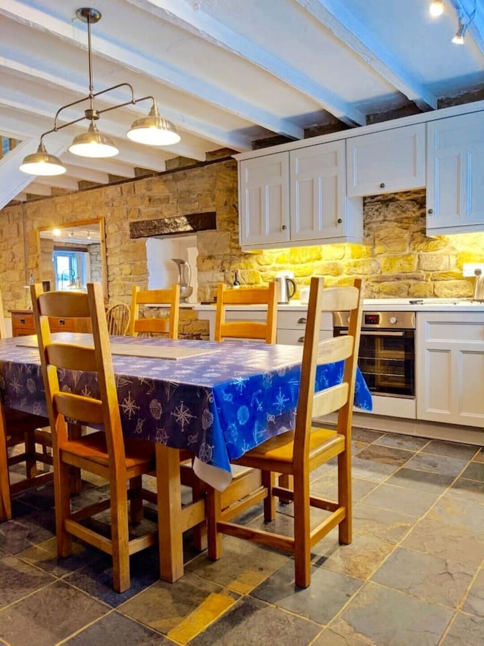 The dining table seats six comfortably