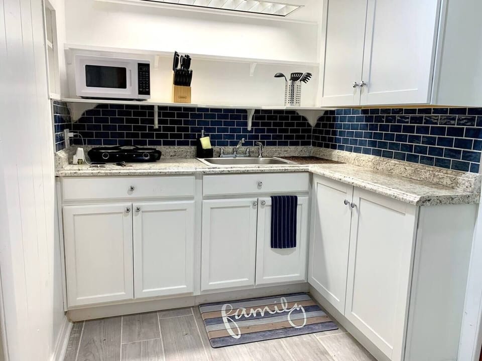 Fully equipped Kitchenette with fridge, microwave, hot plate, coffee maker and all cooking utensils.