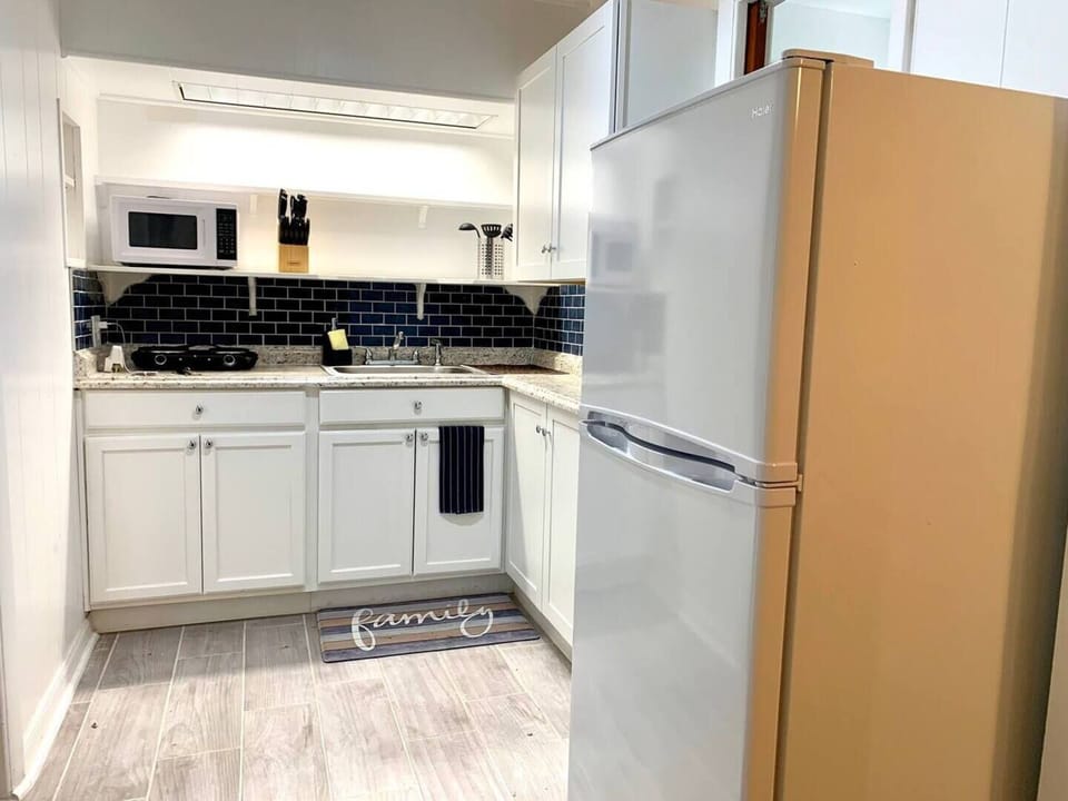 Fully equipped Kitchenette with fridge, microwave, hot plate, coffee maker and all cooking utensils.