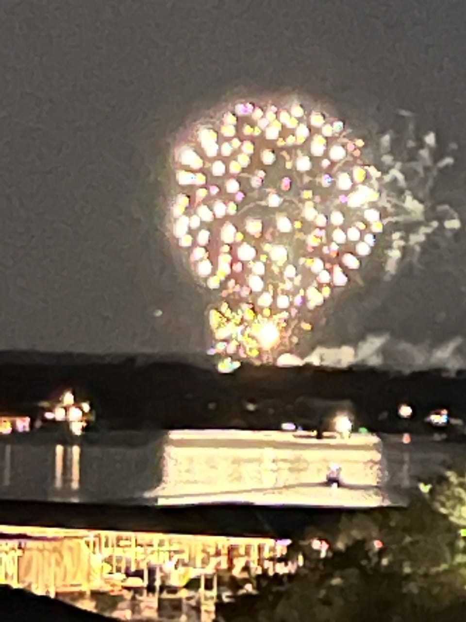 View of Independence Day fireworks from balcony
