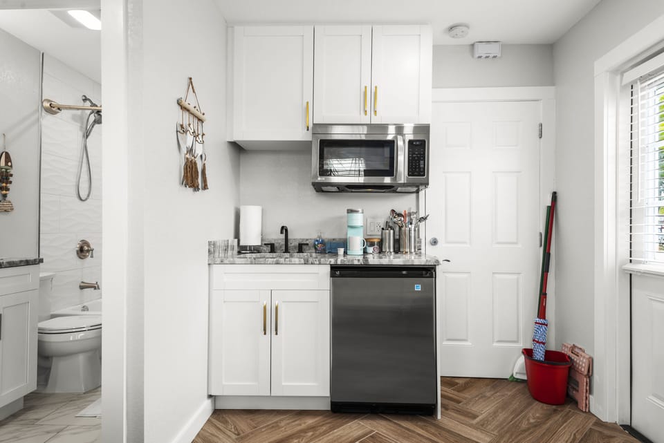 Kitchenette with microwave, Keurig Coffee maker and mini-fridge.