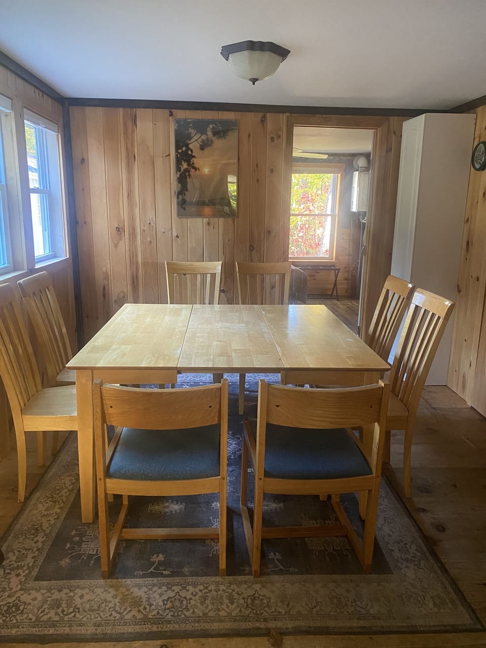 Table expands with built in leaf to seat 8