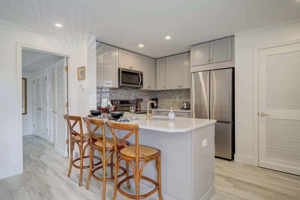 Kitchen area with seating for 3