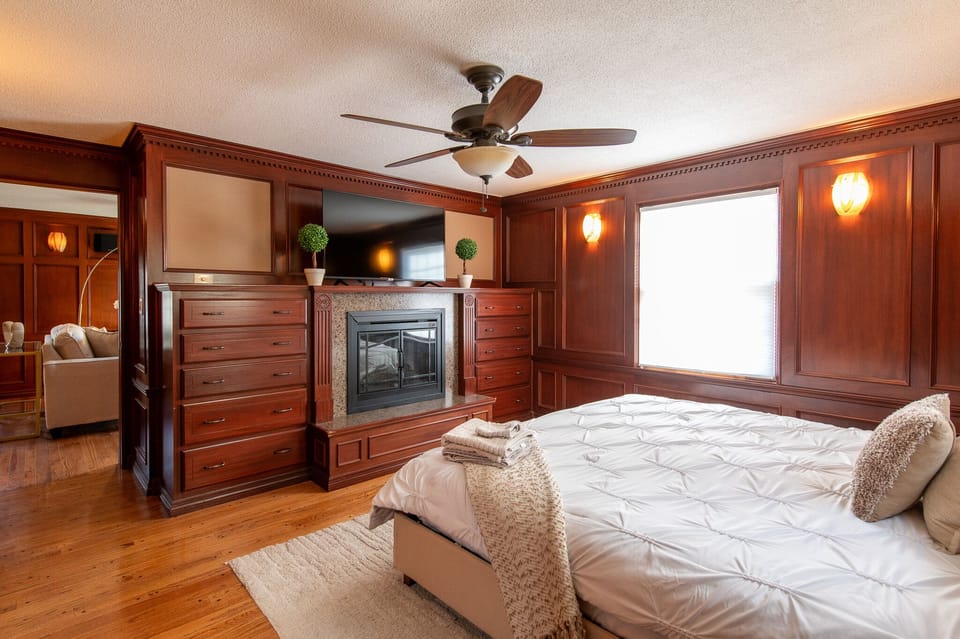 Main Level Lux King Bedroom with Fire Place, Fan, and Smart TV