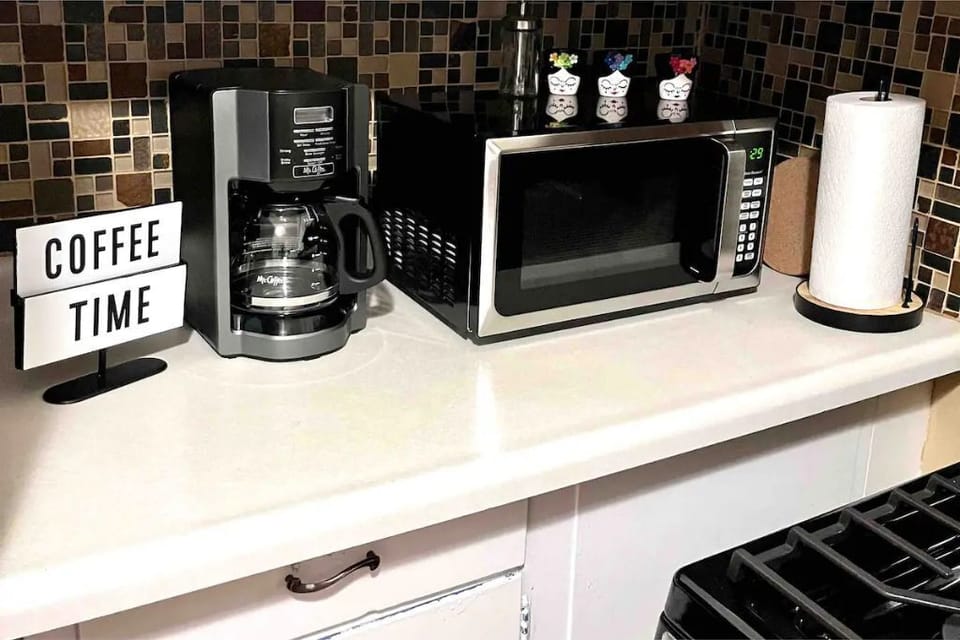 coffee maker + microwave in kitchen