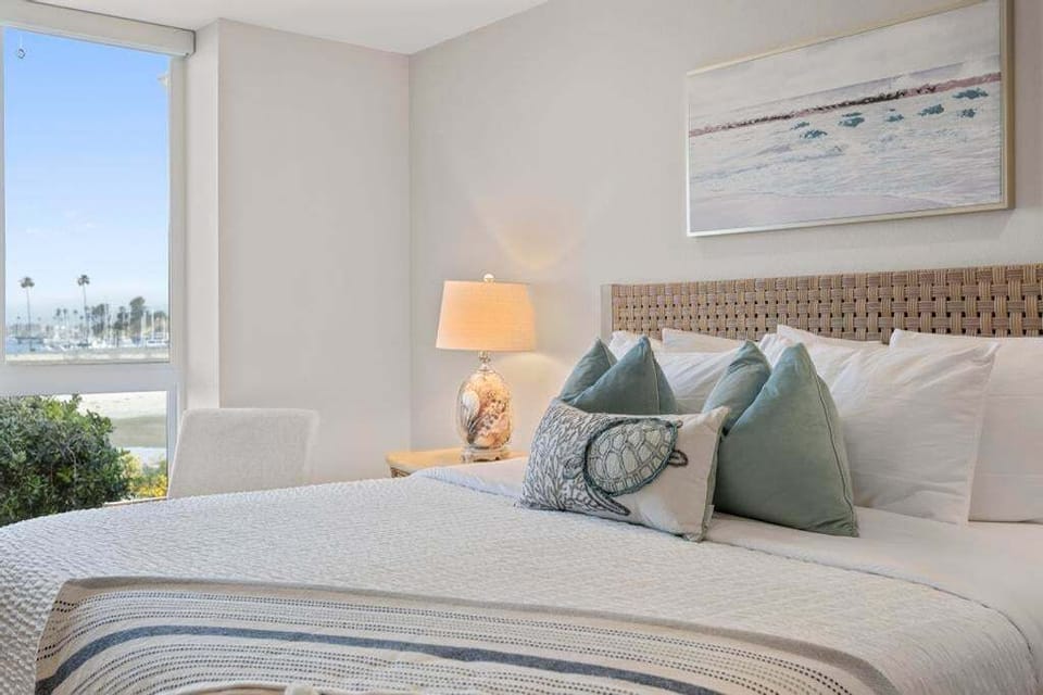 Wake up next to ocean views from the primary bedroom