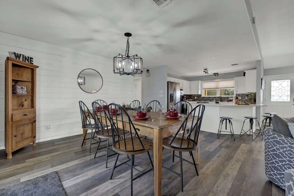 Seating for eight and the dinner table.
