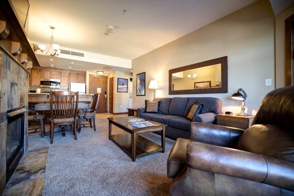 Comfortable living area with cozy seating and a pull-out sofa for additional sleeping space.
