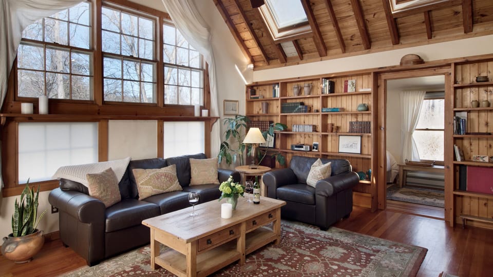 The loft also overlooks the spacious living room…