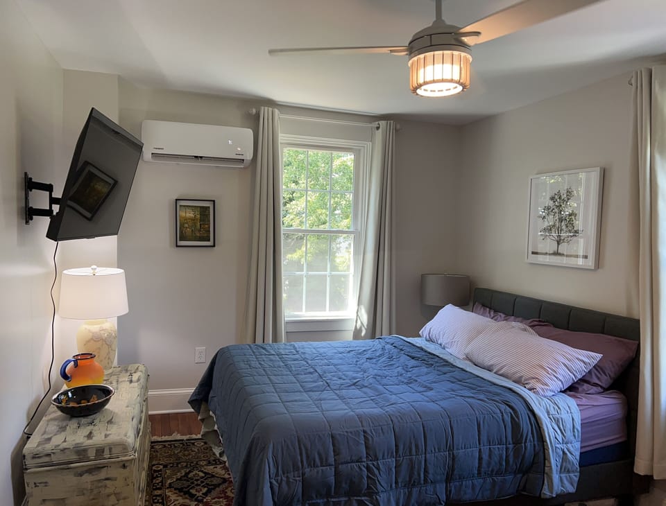 Bedroom, with queen bed and ROKU TV.