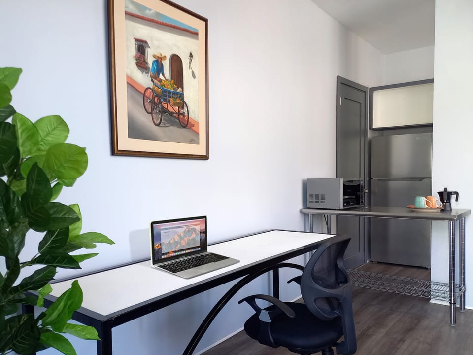 XL custom-made wood and steel study table situated for focused work.