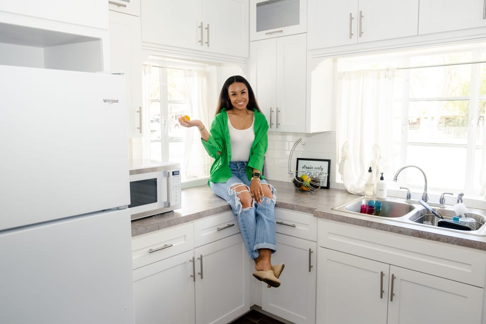 Updated kitchen with pots, pans, utensils, and more! 
