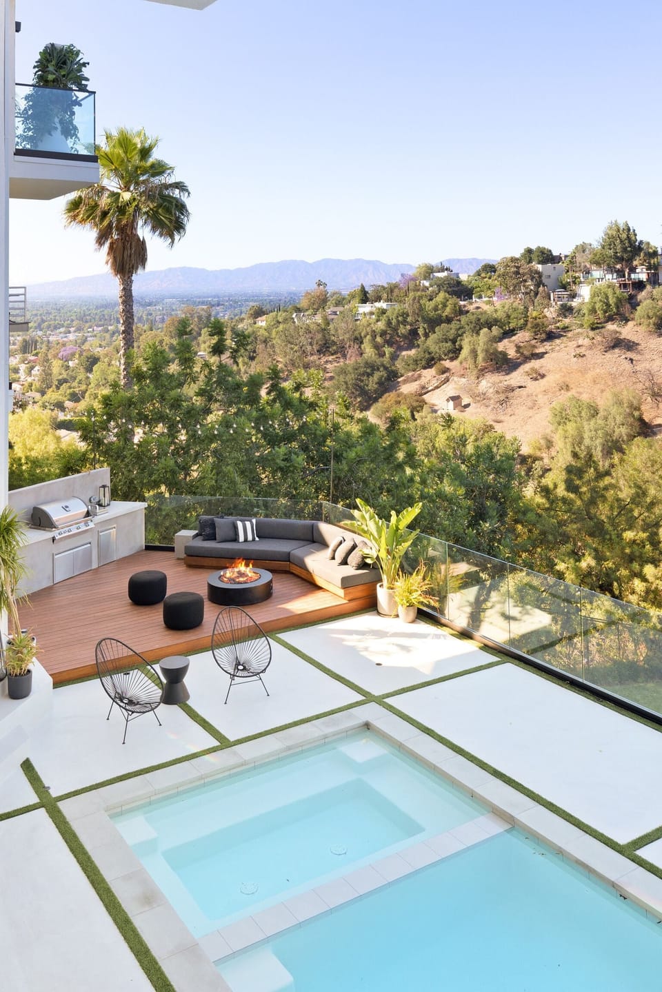 outdoor entertaining area with bbq and fire pit