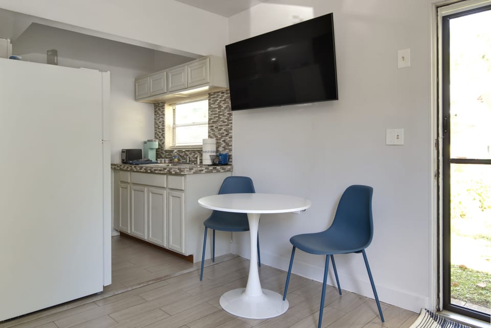 Dining table and chairs. 50" Smart T V.