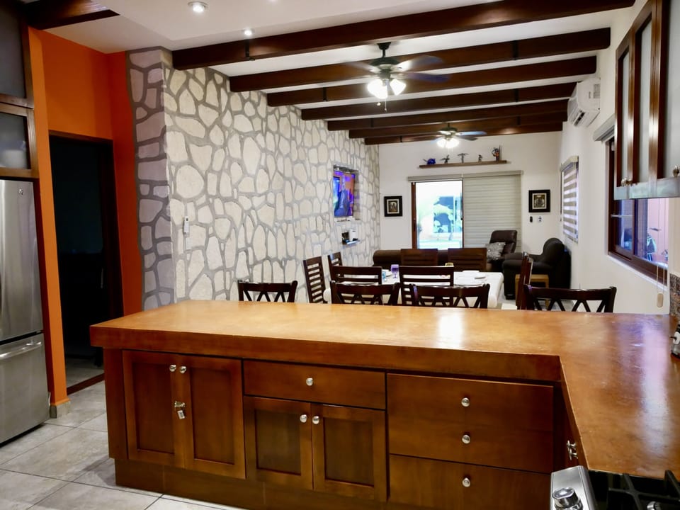 Share conversations of your vacation in the open concept living area.
